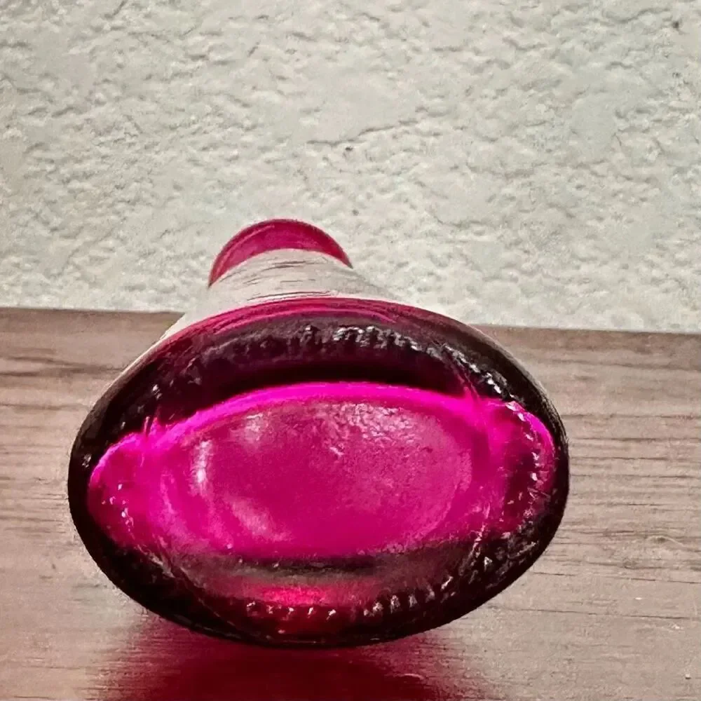 Vintage pink bottle with cork